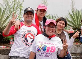 Militantes sandinistas participan en caminata en honor al Repliegue Táctico a Masaya