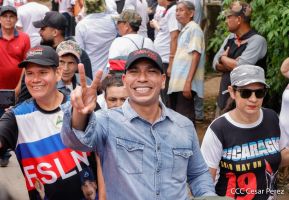 Militantes sandinistas participan en caminata en honor al Repliegue Táctico a Masaya