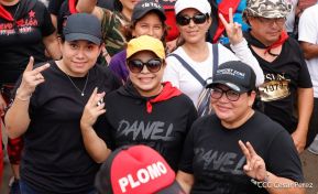 Militantes sandinistas participan en caminata en honor al Repliegue Táctico a Masaya