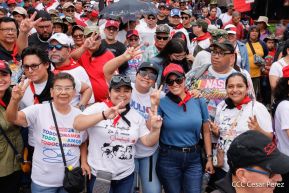 Militantes sandinistas participan en caminata en honor al Repliegue Táctico a Masaya