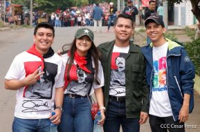 Militantes sandinistas participan en caminata en honor al Repliegue Táctico a Masaya