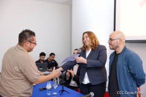 Comunicadores de la Agencia Sputnik con  Medios del Poder Ciudadano