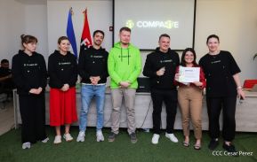 Comunicadores de RT y periodistas de Poder Ciudadano en intercambio de aprendizajes