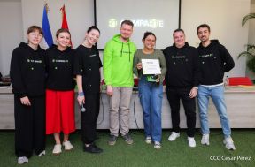 Comunicadores de RT y periodistas de Poder Ciudadano en intercambio de aprendizajes