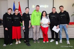 Comunicadores de RT y periodistas de Poder Ciudadano en intercambio de aprendizajes